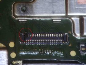 顕微鏡下での回路修復を行っているOPPO A55sの基板
